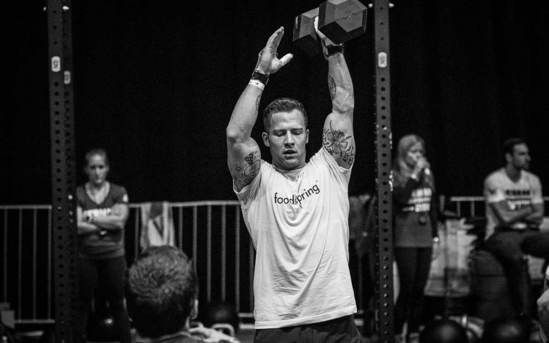 Kevin Winkens performs CrossFit Dumbbell Snatch
